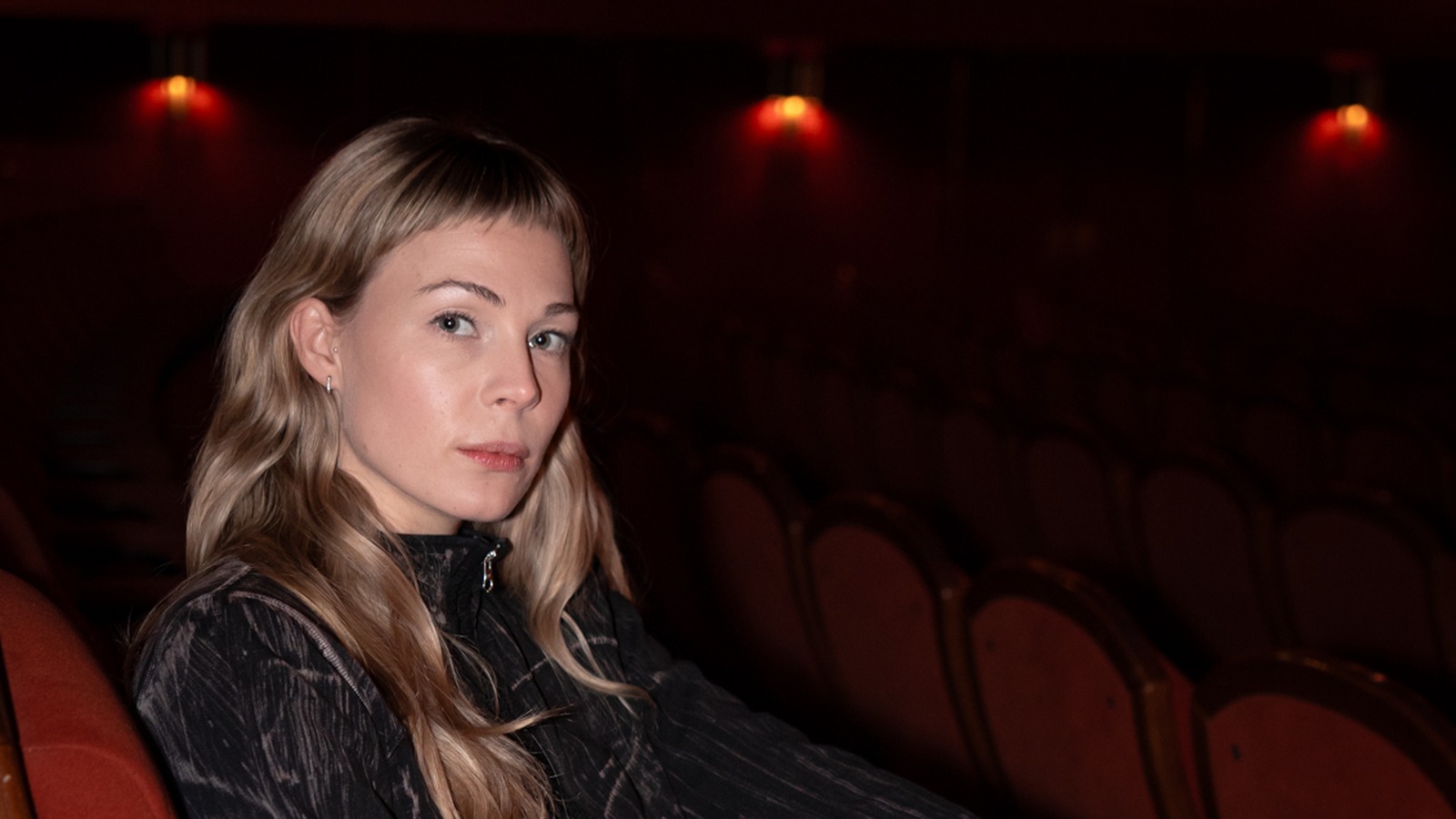 Beatrice Karlsson, Stockholm International Film Festival programme director, seated in a cinema